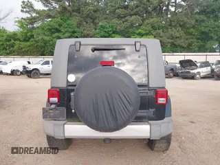 2008 Jeep Wrangler Unlimited Sahara with VIN 1J4GB591X8L523581, listed as a IAAI auction lot 42035446 with 200,570 mi miles and . Bid and sale history available at DreamBid. Image 17.