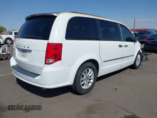 2013 Dodge Grand Caravan SXT with VIN 2C4RDGCG3DR600651, listed as a IAAI auction lot 41947769 with 201,824 mi miles and . Bid and sale history available at DreamBid. Image 4.