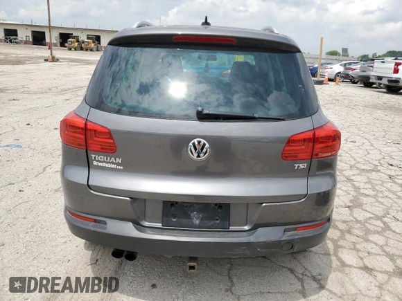 2012 Volkswagen Tiguan SE z VIN WVGAV7AX4CW001417, wystawiony jako Copart lot #61105865 z przebiegiem 168 110 mil mil oraz Czysty tytuł • Clean title. Historia ofert i sprzedaży dostępna na DreamBid. Obrazek 6.