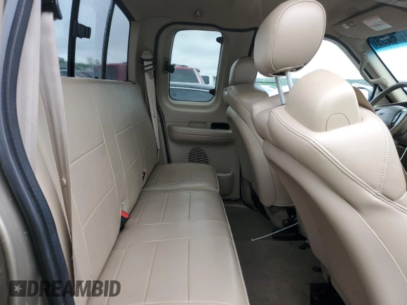 2002 Ford F-150 XL with VIN 1FTRX18L02NA58574, listed as a Copart auction lot 57156255 with 291,950 mi miles and Salvage title. Bid and sale history available at DreamBid. Image 10.