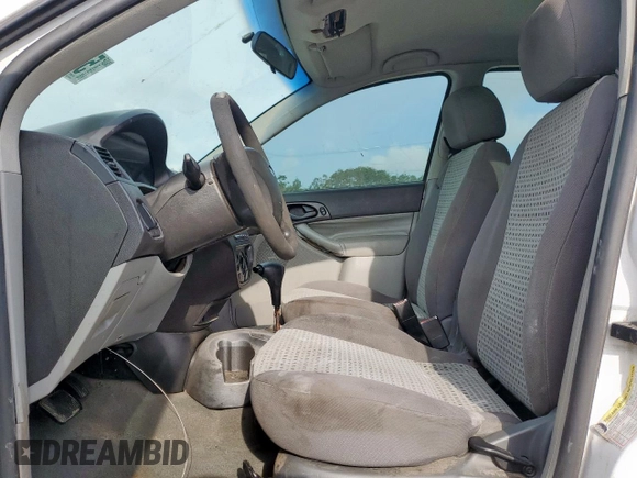 2007 Ford Focus S with VIN 1FAHP34NX7W225626, listed as a Copart auction lot 58202395 with 157,844 mi miles and Salvage title. Bid and sale history available at DreamBid. Image 7.