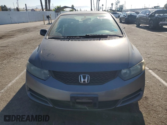 2010 Honda Civic Cpe LX with VIN 2HGFG1B61AH529839, listed as a Copart auction lot 69501724 with 218,443 mi miles and Salvage Title. Bid and sale history available at carsss.com. Image 5.