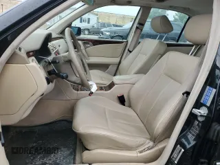 1999 Mercedes-Benz E-Class with VIN WDBJF65H9XA929577, listed as a Copart auction lot 71932364 with 84,806 mi miles and Salvage Title. Bid and sale history available at carsss.com. Image 7.