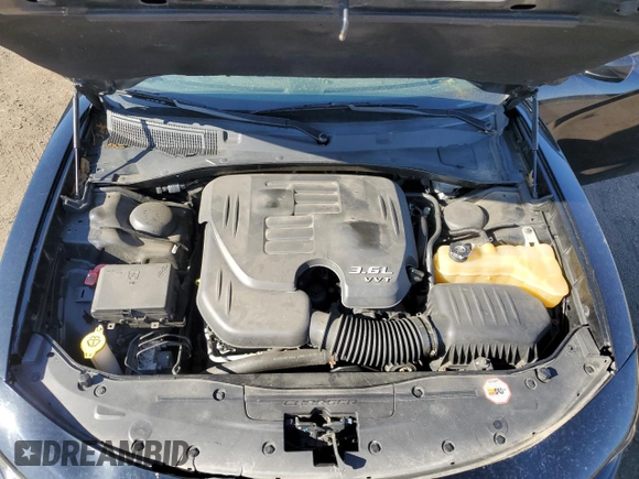 2015 Dodge Charger SE with VIN 2C3CDXBGXFH870769, listed as a Copart auction lot 53486975 with 102,323 mi miles and Salvage Title. Bid and sale history available at carsss.com. Image 11.