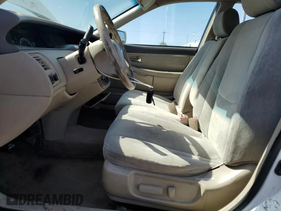 2000 Toyota Avalon XL z VIN 4T1BF28BXYU091688, wystawiony jako Copart lot #58162705 z przebiegiem 177 427 mil mil oraz Szkoda całkowita • Salvage title. Historia ofert i sprzedaży dostępna na DreamBid. Obrazek 7.