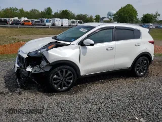 2018 Kia Sportage EX z VIN KNDPNCAC4J7409038, wystawiony jako Copart lot #54779695 z przebiegiem 149 621 mil mil oraz Szkody całkowita. Historia ofert i sprzedaży dostępna na DreamBid. Obrazek 1.