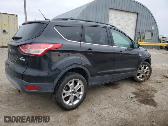 2013 Ford Escape SE with VIN 1FMCU0GXXDUB76102, listed as a Copart auction lot 44226025 with 104,127 mi miles and Salvage Title. Bid and sale history available at DreamBid. Image 3.