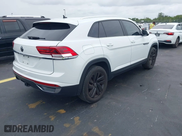 2023 Volkswagen Atlas SE with VIN 1V2JE2CA3PC227230, listed as a IAAI auction lot 42435466 with 86,217 mi miles and . Bid and sale history available at DreamBid. Image 4.