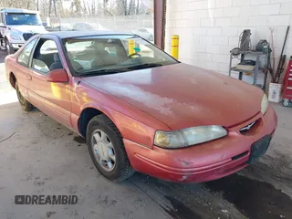 1997 Ford Thunderbird LX with VIN 1FALP6247VH138208, listed as a IAAI auction lot 41562980 with 135,204 mi miles and . Bid and sale history available at DreamBid. Image 1.