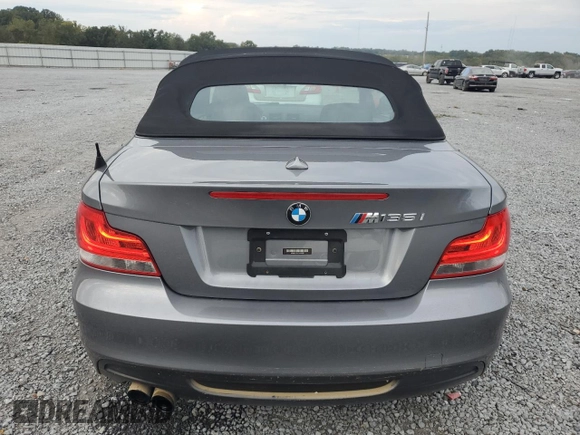2012 BMW 1 Series 135i with VIN WBAUN7C59CVM26082, listed as a Copart auction lot 74711754 with 77,152 mi miles and Salvage title. Bid and sale history available at DreamBid. Image 6.