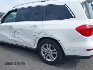 2014 Mercedes-Benz GL 450 z VIN 4JGDF7CE0EA424081, wystawiony jako IAAI lot #42359465 z przebiegiem 145 363 mil mil oraz . Historia ofert i sprzedaży dostępna na DreamBid. Obrazek 17.