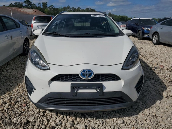 2018 Toyota Prius c One with VIN JTDKDTB32J1615604, listed as a Copart auction lot 52136775 with 66,643 mi miles and Clean Title. Bid and sale history available at carsss.com. Image 5.