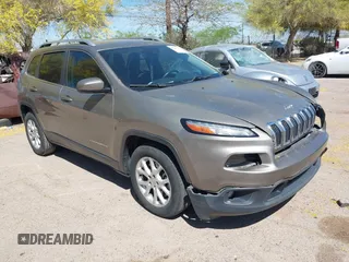2017 Jeep Cherokee Latitude with VIN 1C4PJLCB8HW667384, listed as a IAAI auction lot 42047427 with 103,339 mi miles and . Bid and sale history available at carsss.com. Image 1.