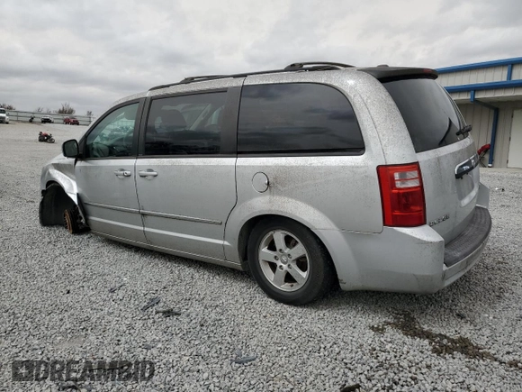 2010 Dodge Grand Caravan SXT with VIN 2D4RN5D12AR159668, listed as a Copart auction lot 49608275 with 212,903 mi miles and Salvage Title. Bid and sale history available at DreamBid. Image 2.