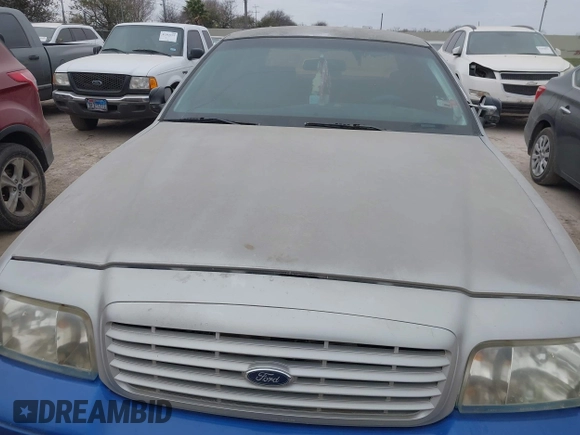 1999 Ford Crown Victoria Police z VIN 2FAFP71W5XX192230, wystawiony jako IAAI lot #41629743 z przebiegiem 170 510 mil mil oraz . Historia ofert i sprzedaży dostępna na DreamBid. Obrazek 10.