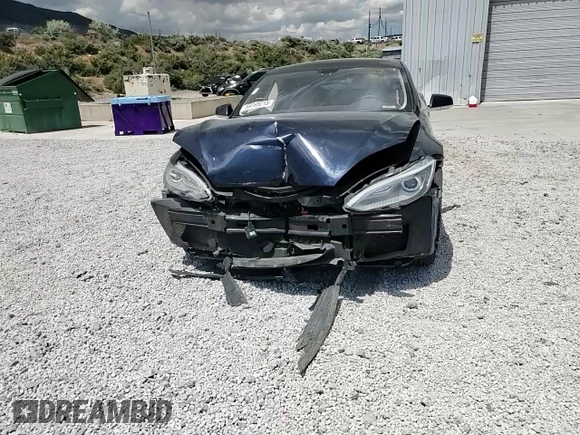 2014 Tesla Model S 60 with VIN 5YJSA1S12EFP29885, listed as a Copart auction lot 59769215 with Not provided miles and Salvage title. Bid and sale history available at DreamBid. Image 13.