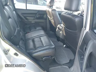 2003 Mitsubishi Montero z VIN JA4NW31S93J037224, wystawiony jako IAAI lot #41848661 z przebiegiem 206 151 mil mil oraz . Historia ofert i sprzedaży dostępna na DreamBid. Obrazek 8.
