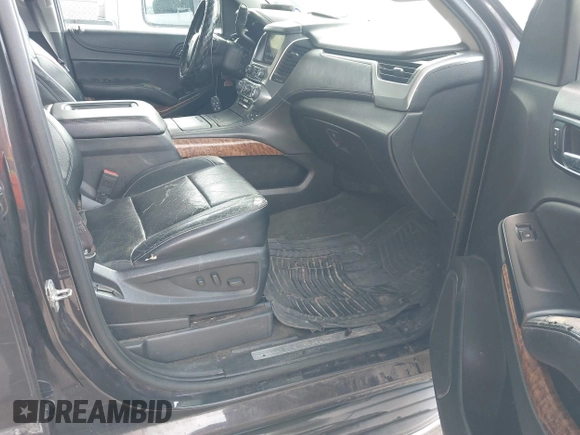 2015 Chevrolet Suburban LTZ with VIN 1GNSCKKC7FR272138, listed as a IAAI auction lot 42047823 with 198,314 mi miles and . Bid and sale history available at DreamBid. Image 5.