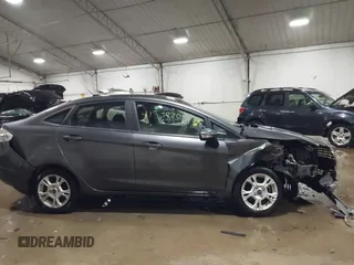 2015 Ford Fiesta SE with VIN 3FADP4BJ9FM164093, listed as a IAAI auction lot 41308905 with 75,839 mi miles. Bid and sale history available at carsss.com. Image 13.