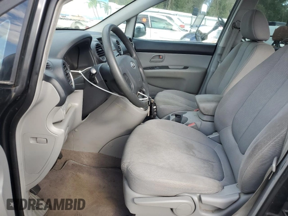2007 Kia Rondo LX with VIN KNAFG525777082626, listed as a Copart auction lot 80005874 with 111,734 mi miles and Salvage Title. Bid and sale history available at carsss.com. Image 7.