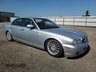 2008 Jaguar XJ 8 with VIN SAJWA71B58SH18731, listed as a Copart auction lot 56846775 with 132,900 mi miles and Clean Title. Bid and sale history available at DreamBid. Image 4.