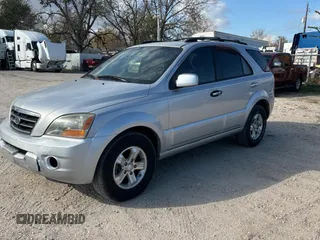 2007 Kia Sorento LX z VIN KNDJD736275693488, wystawiony jako Copart lot #86608024 z przebiegiem 234 513 mil mil oraz Czysty tytuł • Clean title. Historia ofert i sprzedaży dostępna na DreamBid. Obrazek 2.