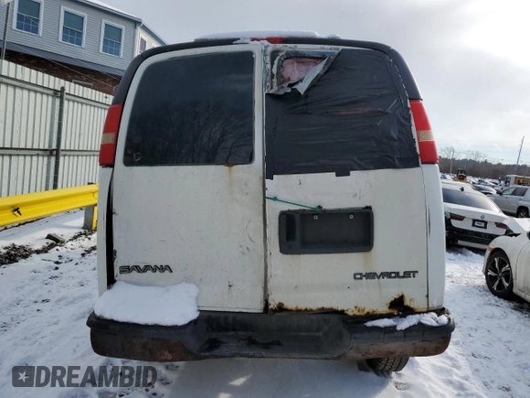 2013 Chevrolet Express Cargo with VIN 1GCWGFBAXD1168503, listed as a Copart auction lot 87638425 with 292,509 mi miles and Clean title. Bid and sale history available at DreamBid. Image 6.