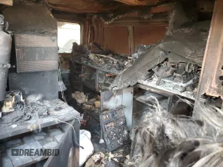 2012 Ford Econoline Cargo z VIN 1FTSE3ES5CDA07013, wystawiony jako Copart lot #84464854 z przebiegiem Nie podano mil oraz Nie do naprawy • Non repairable. Historia ofert i sprzedaży dostępna na DreamBid. Obrazek 10.