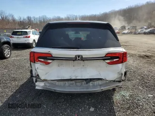 2021 Honda Odyssey Touring with VIN 5FNRL6H85MB008260, listed as a Copart auction lot 49244845 with 58,570 mi miles and Salvage Title. Bid and sale history available at carsss.com. Image 6.