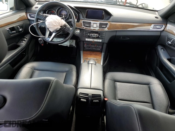 2015 Mercedes-Benz E 350 Luxury with VIN WDDHF8JB6FB100431, listed as a Copart auction lot 56110925 with 106,653 mi miles and Salvage title. Bid and sale history available at DreamBid. Image 8.