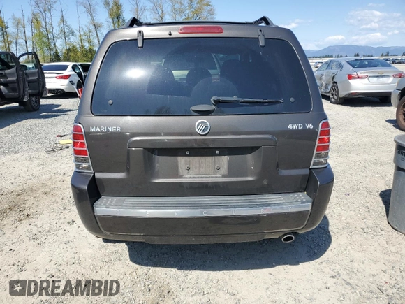 2005 Mercury Mariner Luxury z VIN 4M2CU57135DJ21208, wystawiony jako Copart lot #53555425 z przebiegiem 95 409 mil mil oraz Szkody całkowita. Historia ofert i sprzedaży dostępna na DreamBid. Obrazek 6.