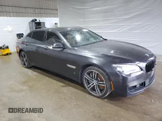 2015 BMW 7 Series 750Li xDrive z VIN WBAYF8C57FD653916, wystawiony jako Copart lot #52864275 z przebiegiem 138 811 mil mil oraz Szkoda całkowita • Salvage title. Historia ofert i sprzedaży dostępna na DreamBid. Obrazek 4.