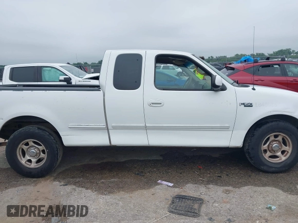 2001 Ford F-150 XL z VIN 1FTZX17281NB02781, wystawiony jako IAAI lot #42377688 z przebiegiem 180 830 mil mil oraz . Historia ofert i sprzedaży dostępna na DreamBid. Obrazek 13.