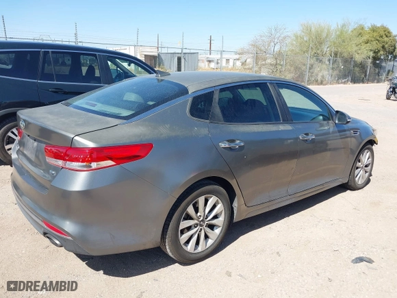 2016 Kia Optima EX with VIN 5XXGU4L35GG076578, listed as a IAAI auction lot 41770838 with 75,918 mi miles. Bid and sale history available at carsss.com. Image 4.