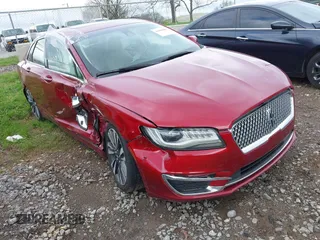 2017 Lincoln MKZ Reserve z VIN 3LN6L5E95HR662699, wystawiony jako IAAI lot #41968060 z przebiegiem 141 244 mil mil oraz . Historia ofert i sprzedaży dostępna na DreamBid. Obrazek 1.