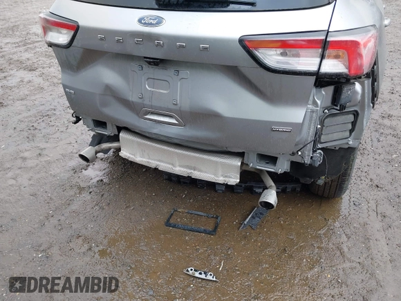 2021 Ford Escape SE Hybrid z VIN 1FMCU0BZ4MUA38497, wystawiony jako IAAI lot #42306761 z przebiegiem 20 555 mil mil oraz . Historia ofert i sprzedaży dostępna na DreamBid. Obrazek 6.