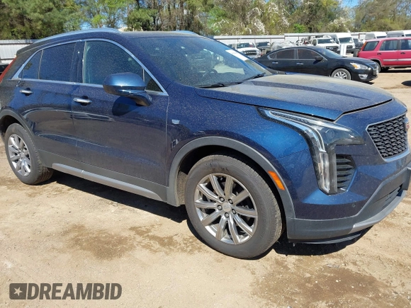 2019 Cadillac XT4 FWD Premium Luxury z VIN 1GYFZCR47KF109394, wystawiony jako IAAI lot #41864606 z przebiegiem 98 425 mil mil oraz . Historia ofert i sprzedaży dostępna na DreamBid. Obrazek 1.