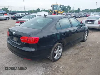 2011 Volkswagen Jetta SE with VIN 3VWDX7AJ7BM052493, listed as a IAAI auction lot 42745045 with 179,732 mi miles and . Bid and sale history available at DreamBid. Image 4.