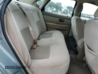 2006 Ford Taurus SE z VIN 1FAFP53U16A142612, wystawiony jako Copart lot #59805145 z przebiegiem 116 999 mil mil oraz Czysty tytuł • Clean title. Historia ofert i sprzedaży dostępna na DreamBid. Obrazek 10.