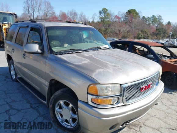 2002 GMC Yukon Denali z VIN 1GKEK63U82J341696, wystawiony jako IAAI lot #41772116 z przebiegiem 259 337 mil mil oraz . Historia ofert i sprzedaży dostępna na DreamBid. Obrazek 1.