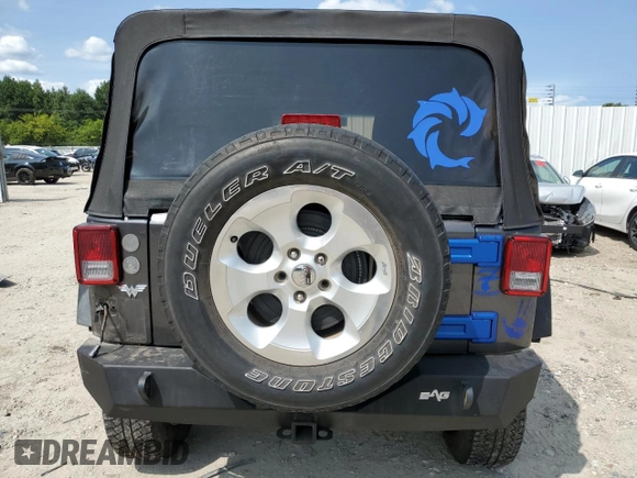 2018 Jeep Wrangler JK Unlimited Sport S with VIN 1C4BJWDG3JL899209, listed as a Copart auction lot 67705634 with 100,679 mi miles and Salvage Title. Bid and sale history available at carsss.com. Image 6.