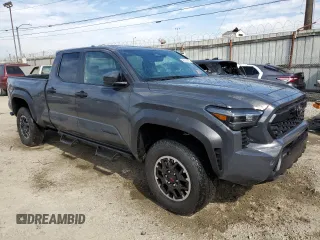 2025 Toyota Tacoma SR with VIN 3TMLB5JNXSM095729, listed as a Copart auction lot 46190185 with 921 mi miles and Salvage Title. Bid and sale history available at DreamBid. Image 4.