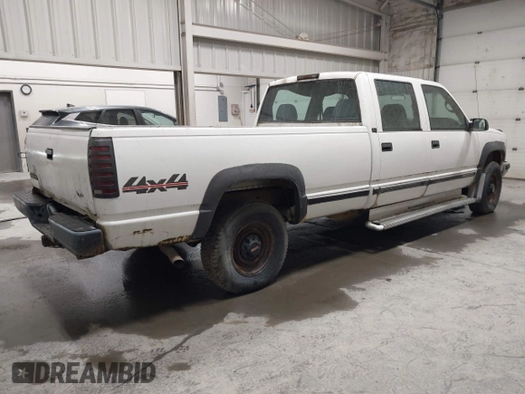 1997 GMC Sierra 3500 z VIN 1GTHK33F4VF004765, wystawiony jako IAAI lot #42053137 z przebiegiem 129 249 mil mil oraz . Historia ofert i sprzedaży dostępna na DreamBid. Obrazek 4.