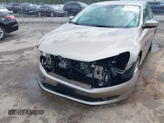 2015 Volkswagen Passat 1.8T Limited Edition with VIN 1VWAT7A32FC120769, listed as a IAAI auction lot 42013547 with 61,451 mi miles. Bid and sale history available at carsss.com. Image 6.