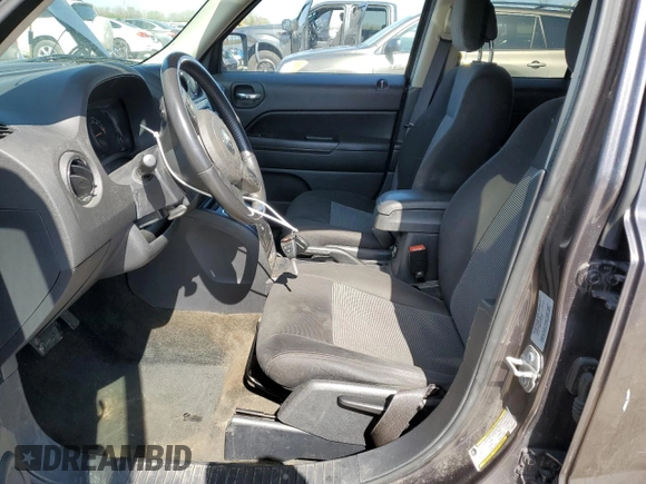 2016 Jeep Patriot Latitude with VIN 1C4NJPFA9GD793975, listed as a Copart auction lot 51990705 with 187,706 mi miles and Salvage title. Bid and sale history available at DreamBid. Image 7.