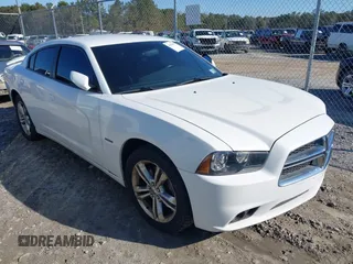 2013 Dodge Charger RT with VIN 2C3CDXDT1DH503587, listed as a IAAI auction lot 41354849 with 122,824 mi miles. Bid and sale history available at carsss.com. Image 1.