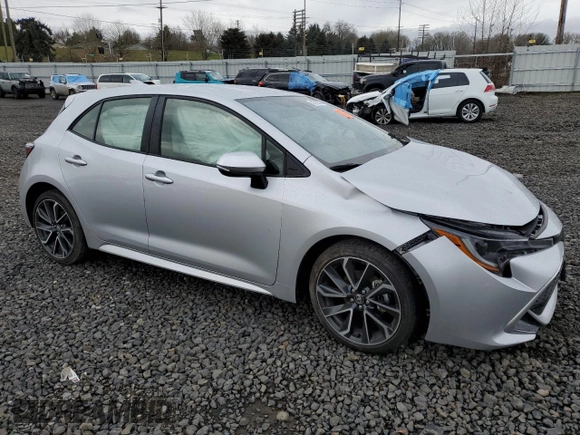 2022 Toyota Corolla Hatchback XSE with VIN JTNC4MBEXN3188237, listed as a Copart auction lot 43720505 with 15,874 mi miles and Salvage Title. Bid and sale history available at carsss.com. Image 4.