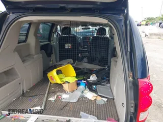 2013 Ram Cargo Van Tradesman with VIN 2C4JRGAG7DR781870, listed as a IAAI auction lot 39762348 with 114,717 mi miles and . Bid and sale history available at DreamBid. Image 8.