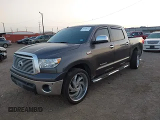 2013 Toyota Tundra Limited with VIN 5TFFY5F19DX137337, listed as a IAAI auction lot 41848771 with 182,886 mi miles and . Bid and sale history available at DreamBid. Image 2.