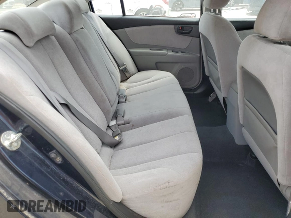 2010 Kia Optima LX with VIN KNAGG4A87A5391946, listed as a Copart auction lot 54005025 with 144,652 mi miles and Salvage Title. Bid and sale history available at carsss.com. Image 10.